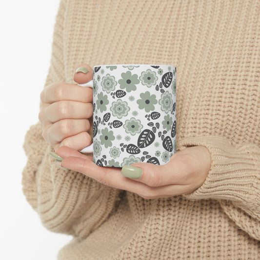 Vintage Green Blooms: White Ceramic Mug with Retro Light Green Flowers and Dark Green Leaves