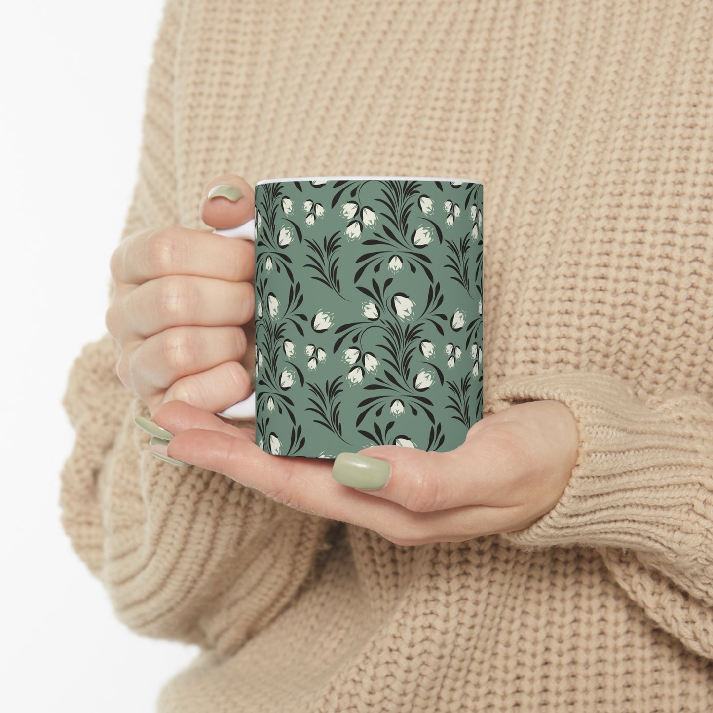 Pastel Botanical Serenity: Green Ceramic Mug with Black and White Leaves and Flowers