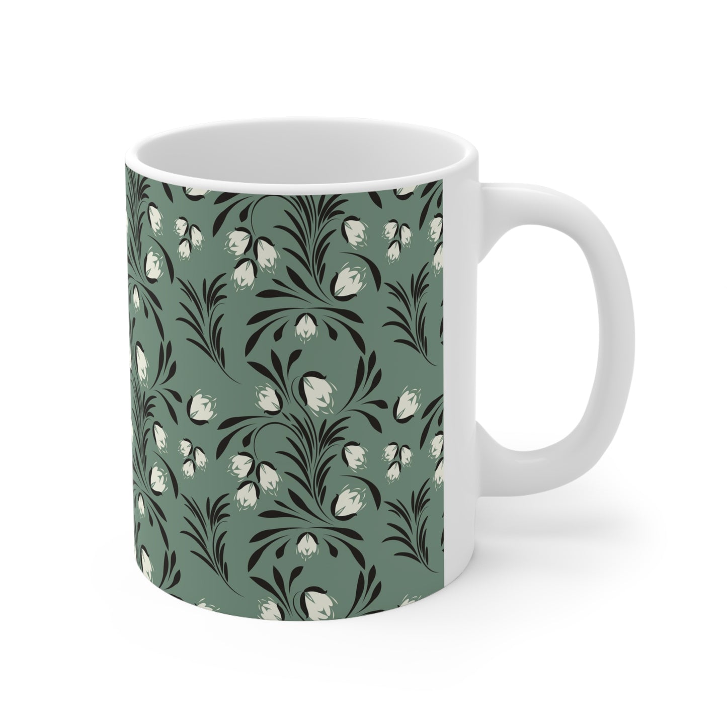 Pastel Botanical Serenity: Green Ceramic Mug with Black and White Leaves and Flowers