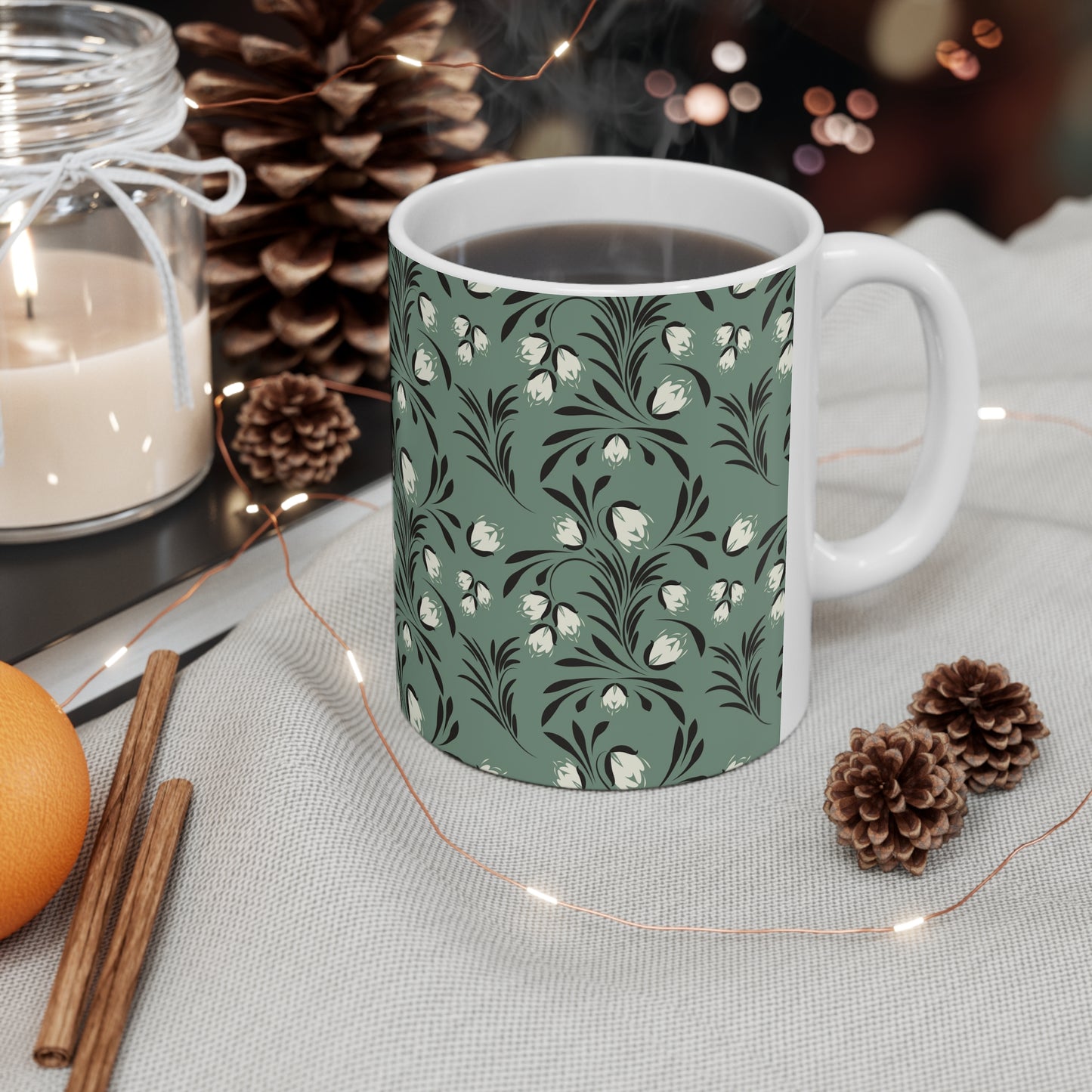 Pastel Botanical Serenity: Green Ceramic Mug with Black and White Leaves and Flowers