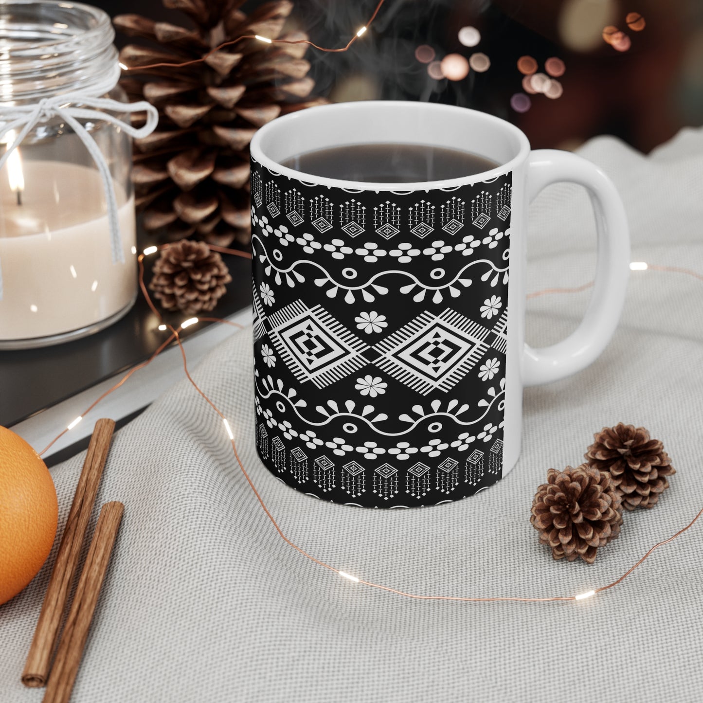 Elegance in Monochrome: Black Ceramic Mug with White Repeating Patterns