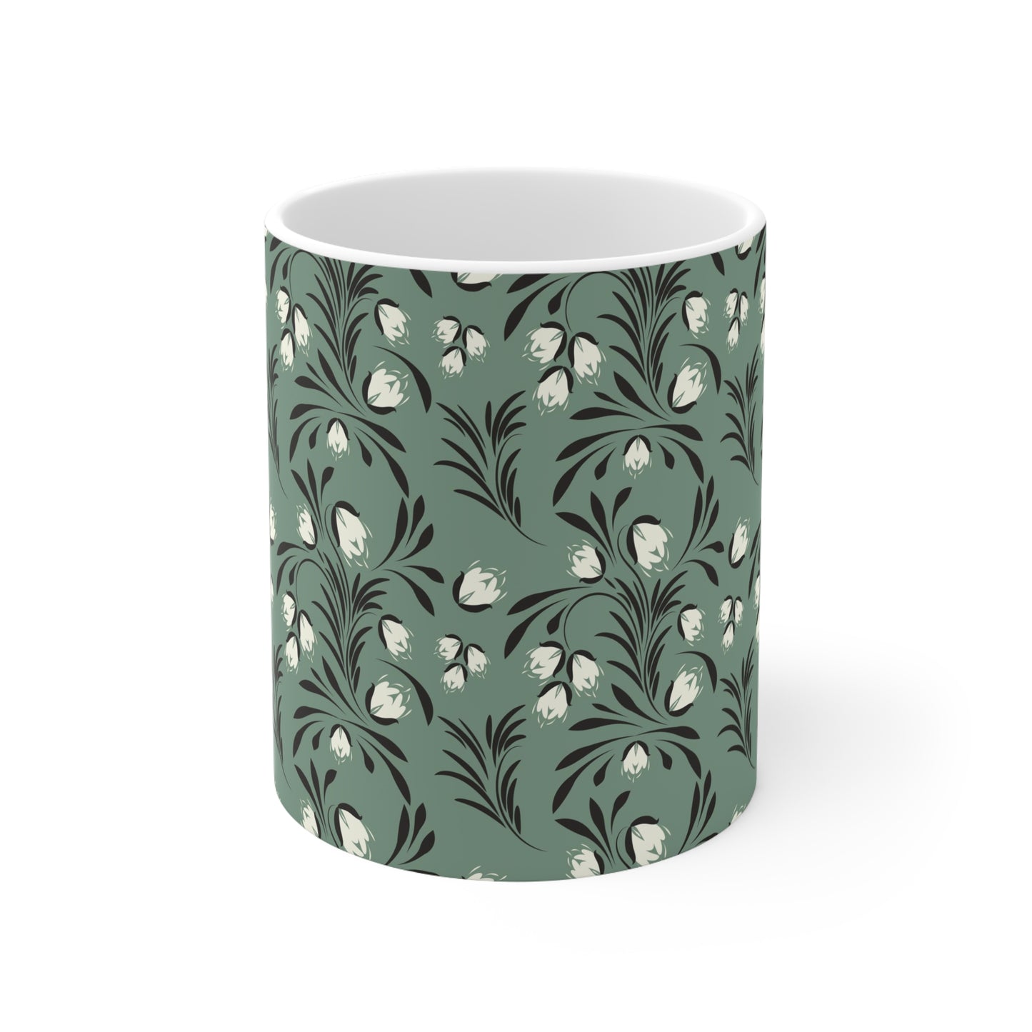 Pastel Botanical Serenity: Green Ceramic Mug with Black and White Leaves and Flowers