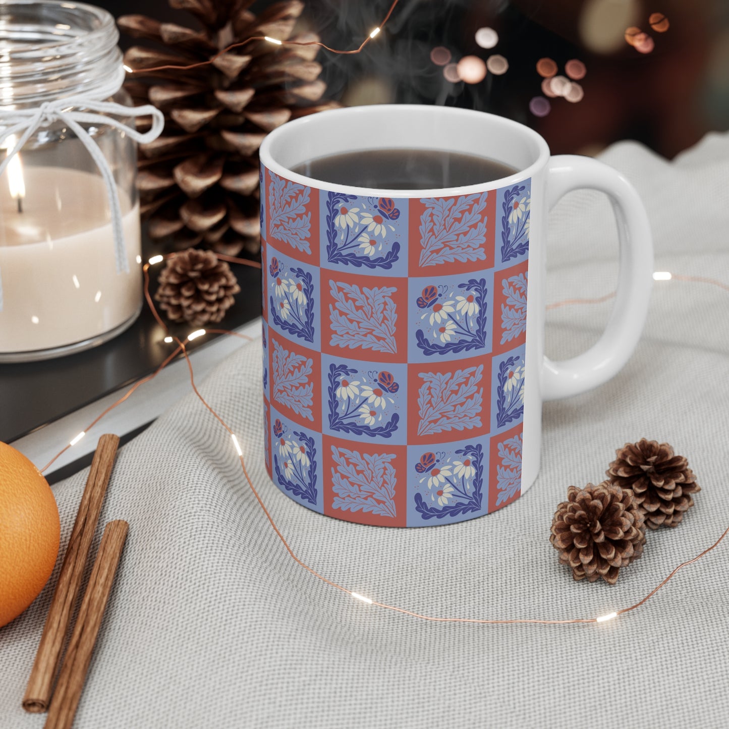 Stamped Elegance: Light Blue and Red Mug with White Flowers