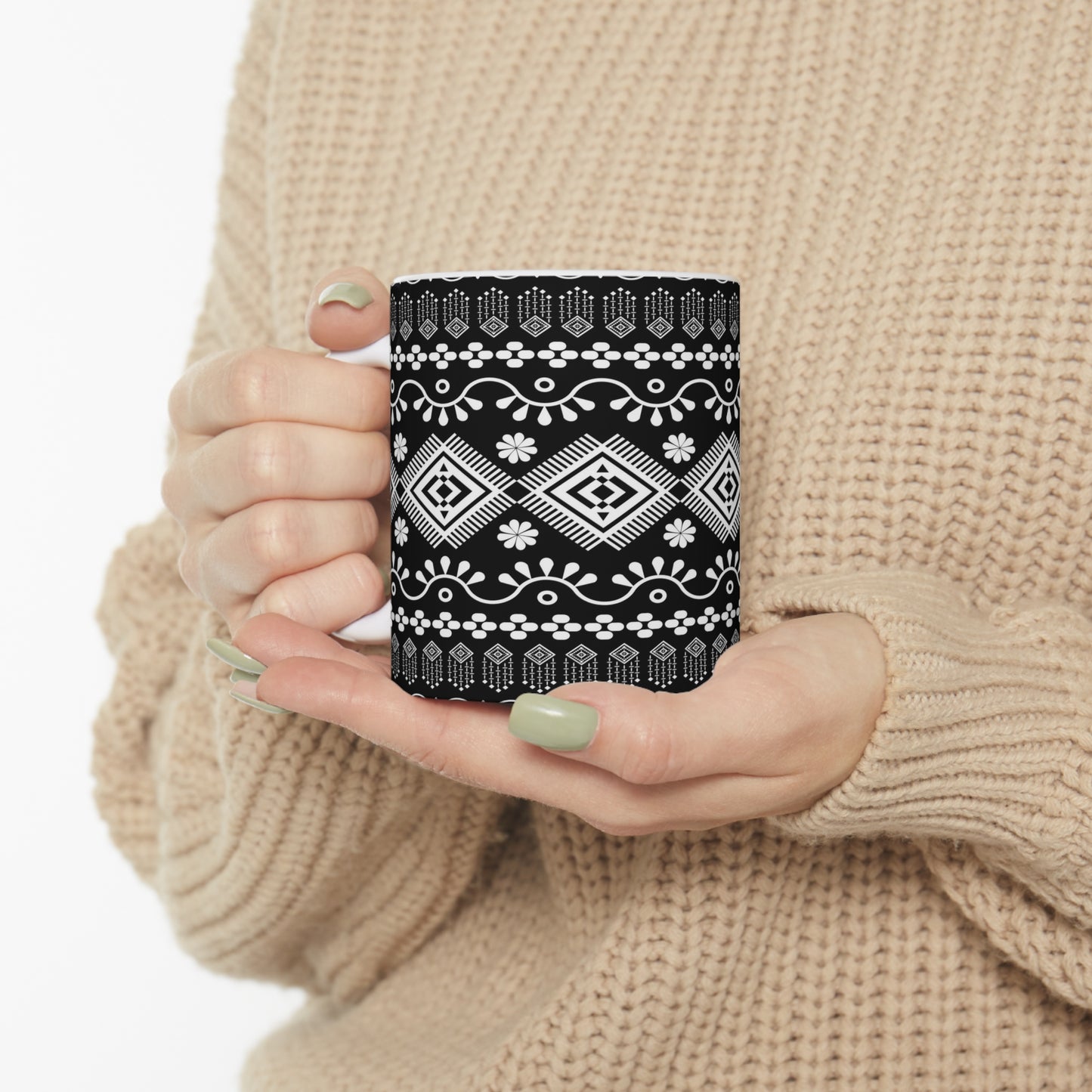 Elegance in Monochrome: Black Ceramic Mug with White Repeating Patterns